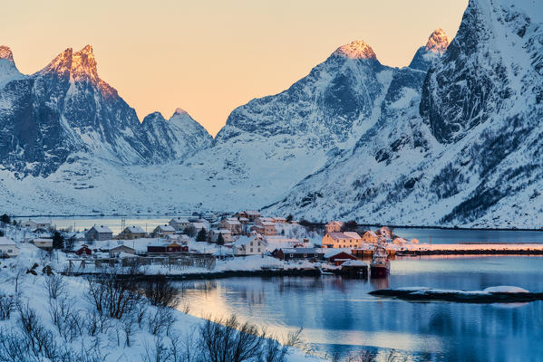 Sunrise over the village of Reine in winter, Nordland, Lofoten Islands, Norway