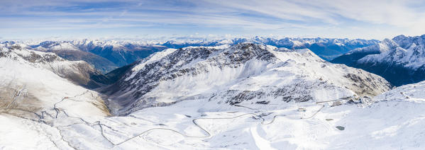 Aerial view of the snowy Stelvio Pass road and Umbrail Pass, Bormio, Sondrio province, Valtellina, Lombardy, Italy