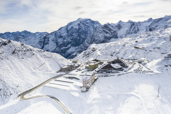 Stelvio Pass and Ortles mount covered with snow, aerial view, Sondrio province, Valtellina, Lombardy, Italy