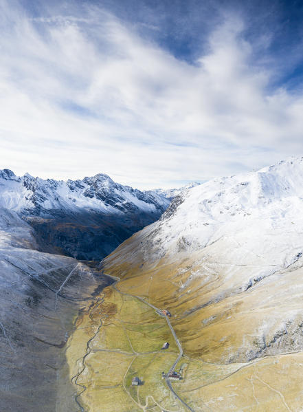 Aerial panoramic of clouds over Cresta di Reit in autumn, Braulio Valley, Bormio, Sondrio province, Valtellina, Lombardy, Italy