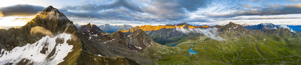 Aerial panoramic of Corno dei Tre Signori and Gavia Pass at dawn, Valtellina, Sondrio province, Lombardy, Italy