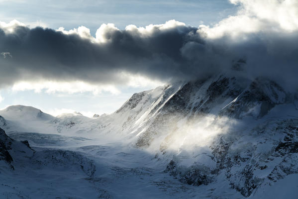 Monte Rosa glacier and snowcapped Lyskamm lit by sun rays, Zermatt, canton of Valais, Switzerland