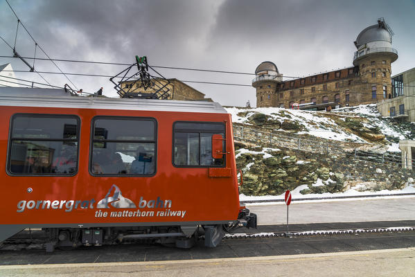 Tourists enjoying the journey on Gornergrat Bahn train, Zermatt, canton of Valais, Switzerland