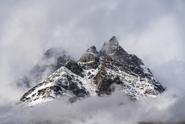 Majestic Ober Gabelhorn peak in a sea of clouds, Zermatt, canton of Valais, Switzerland