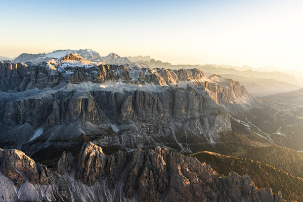 Aerial view of Sella Group at sunset in autumn, Val Gardena, Val di Fassa, Dolomites, South Tyrol, Italy