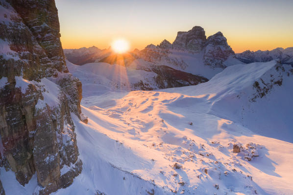 Sunrise lit the fresh snow on Lastoi De Formin and Pelmo mountain, aerial view, Dolomites, Belluno province, Veneto, Italy