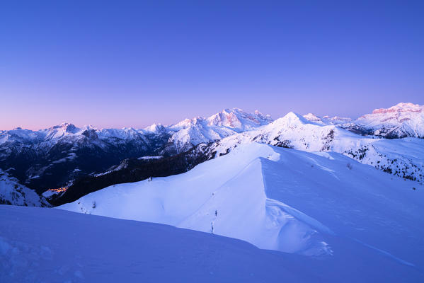 Dusk over Giau Pass covered with snow with Marmolada in background, Dolomites, Belluno province, Veneto, Italy