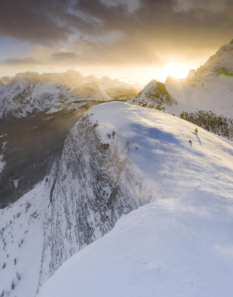 Aerial panoramic of the snow capped Campanili di Popena mountain and Sorapis at sunset, Misurina, Dolomites, Belluno, Veneto, Italy