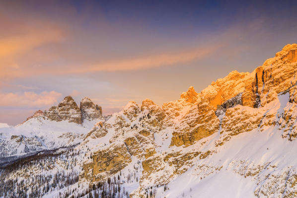 Winter sunset on snow capped peaks of Tre Cime di Lavaredo, Misurina, Dolomites, Auronzo di Cadore, Belluno, Veneto, Italy