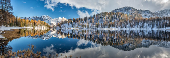 Panoramic shot of the Lake Malghette in autumn with Dolomites of Brenta in the background. Trentino Alto Adige. Italy. Europe