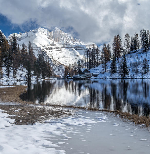 Malghette Hut surrounded by snowy woods Dolomites Trentino Alto Adige Italy Europe