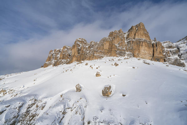 Sass Pordoi in winter seen from Pordoi Pass, aerial view, Sella Group, Dolomites, Trentino-Alto Adige, Italy