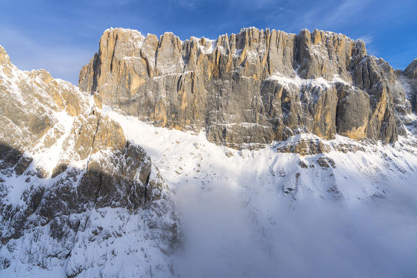 South face of Punta Penia surrounded by snow, aerial view, Dolomites, Trentino-Alto Adige, Italy