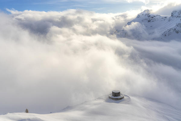 German military memorial at Pordoi Pass in winter, Dolomites, Trentino-Alto Adige, Italy