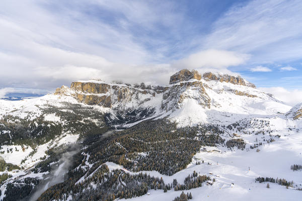 Aerial view of Pordoi Pass and Sella Group in winter, Dolomites, Trentino-Alto Adige, Italy