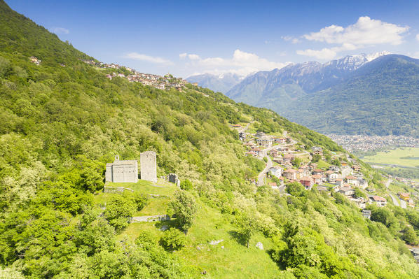 Aerial view of Domofole Castle and Rhaetian Alps, Costiera dei Cech, Mello, Valtellina, Sondrio province, Lombardy, Italy