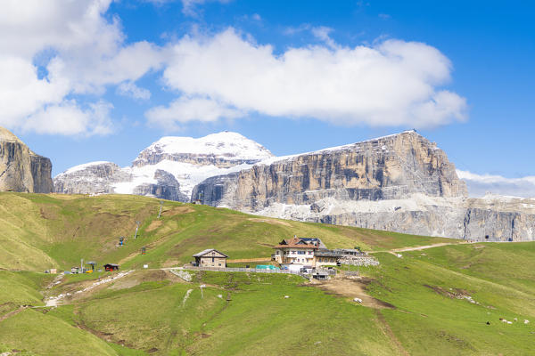 Aerial view of Rifugio Friedrich August with Dolomites peaks in background, Passo Sella, Val di Fassa, Trentino, Italy