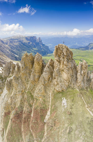 Aerial panoramic of Denti di Terrarossa pinnacles, Alpe di Siusi/Seiser Alm and Sciliar massif, Dolomites, South Tyrol, Italy