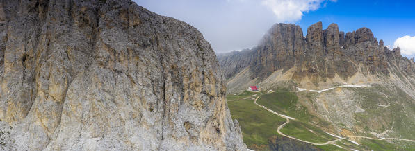 Panoramic of Alpe di Tires hut (Tierser Alpl) at feet of Denti di Terrarossa, aerial view, Dolomites, Trentino Alto Adige, Italy