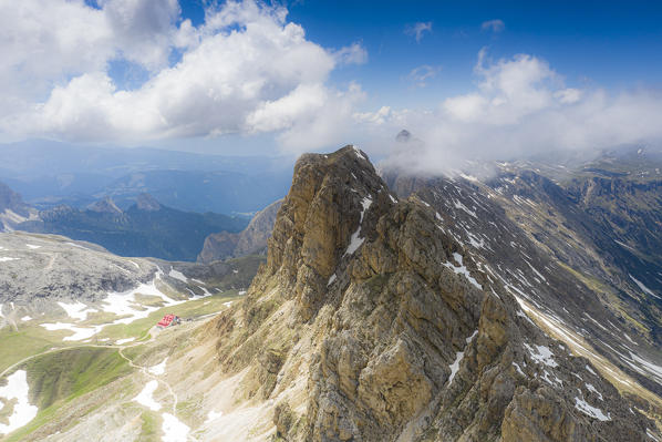 Panoramic of Denti di Terrarossa rock pinnacles above the Alpe di Tires hut, aerial view, Dolomites, Trentino Alto Adige, Italy