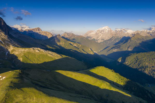 Panoramic of Marmolada, Pordoi and Col Rodella during sunset, aerial view, Dolomites, Trentino-Alto Adige, Italy