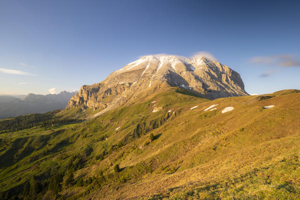 Sunset over meadows surrounding Sassopiatto, Dolomites, Trentino-Alto Adige, Italy