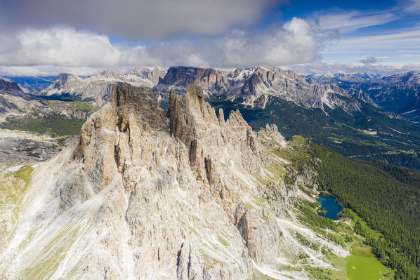 Aerial panoramic of tall rock of Cima Ambrizzola, Tofane and Federa Lake, Ampezzo Dolomites, Belluno province, Veneto, Italy