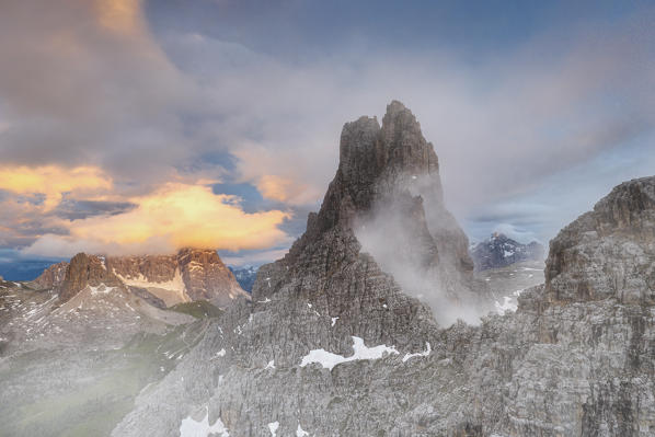 Fog at sunset over Cima Ambrizzola and Monte Pelmo, aerial view, Ampezzo Dolomites, Belluno province, Veneto, Italy