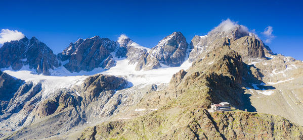 Panoramic of Bernina Group and Rifugio Marinelli hut, aerial view, Valmalenco, Valtellina, Sondrio province, Lombardy, Italy