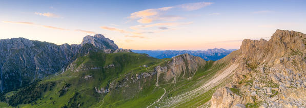 Panoramic of Sass De Putia (Peitlerkofel) mountain and Rifugio Genova hut at sunrise, Val di Funes, South Tyrol, Dolomites, Italy