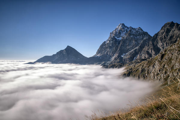 Low Clouds around Monviso. Cozian Alps, Piedmont, Italy Europe