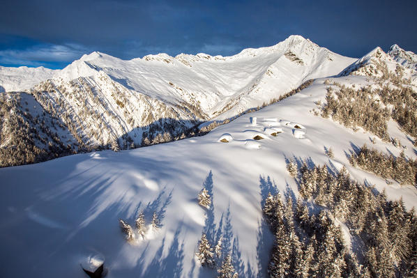 Aerial view of Scima Alp covered in snow. Chiavenna Valley Lombardy, Italy. Europe