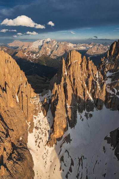 Aerial view of Sassolungo group Cinque Dita and Marmolada at sunset, Dolomites, South Tyrol, Italy