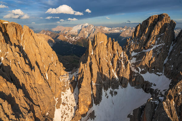 Aerial view of Sassolungo group Cinque Dita and Marmolada at sunset, Dolomites, South Tyrol, Italy