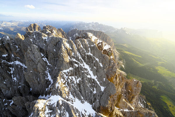 Aerial view of Sassolungo group at sunset, Dolomites, South Tyrol, Italy