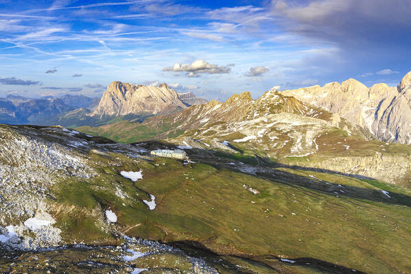 Aerial view of Sciliar massif with Rifugio Bolzano, Sassopiatto and Sassolungo on background, Dolomites, South Tyrol, Italy