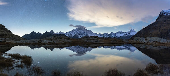 Panoramic of majestic Monte Disgrazia under the stars in autumn, Alpe Fora, Valmalenco, Valtellina, Sondrio province, Lombardy, Italy