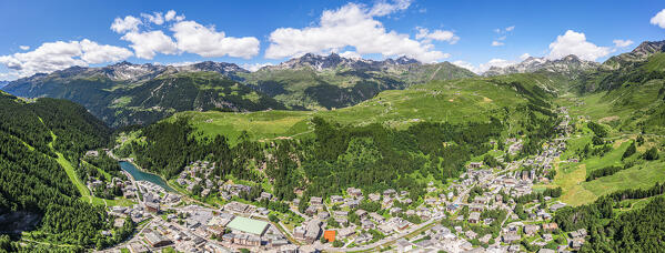 Aerial panoramic of the alpine village of Madesimo in summer, Valle Spluga, Valtellina, Lombardy, Italy