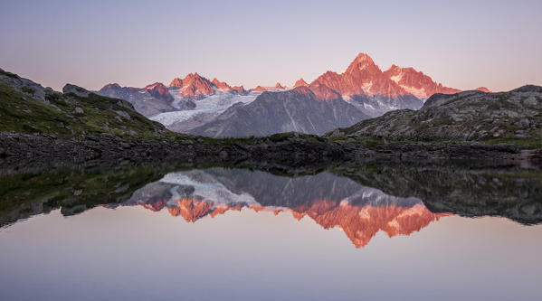 Reflections at sunset. Lac de Chesery. Mont Blanc. Haute Savoie France Europe