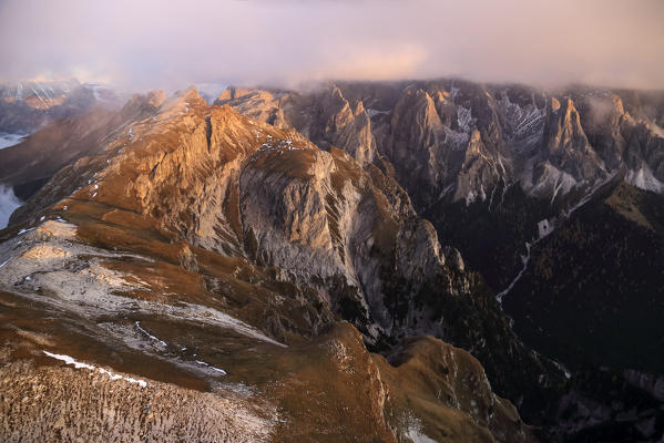 Aerial view of the group Catinaccio Rosengarter at sunset. Sciliar Natural Park. Val di Fassa. Dolomites. Italy Europe
