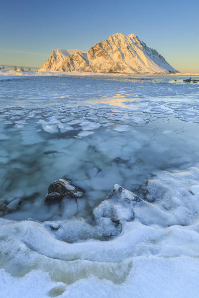 Sunlight on the mountains of Gymsøya seen from Smorten. Lofoten Islands Norway Europe