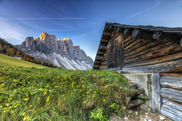 The group of Odle views from Malga Gampen at dawn. Funes Valley. Dolomites South Tyrol Italy Europe