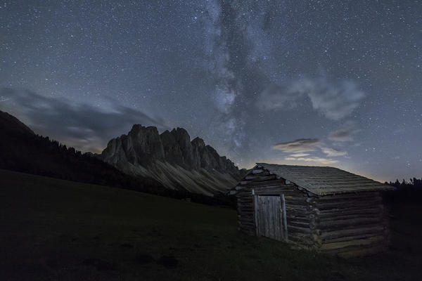 The Milky Way in the  starry sky above the Odle. Funes Valley South Tyrol Dolomites Italy Europe