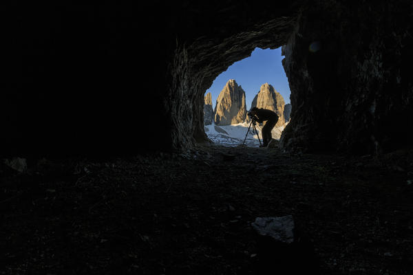 The photographer chose a cave in front of  the Three Peaks of Lavaredo for his shots. Sesto Dolomites Trentino Alto Adige Italy