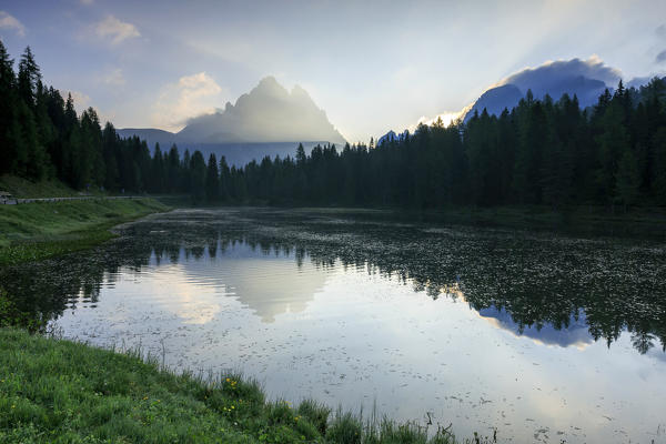 The Three Peaks of Lavaredo are reflected in Lake Antorno at sunrise. Veneto Sesto Dolomites Italy Europe