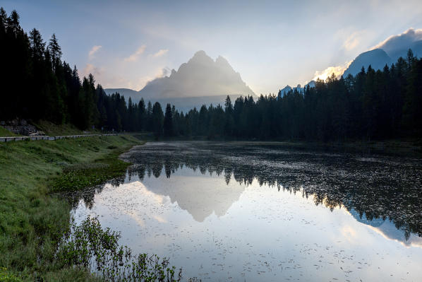 The Three Peaks of Lavaredo are reflected in Lake Antorno at sunrise. Veneto Sesto Dolomites Italy Europe