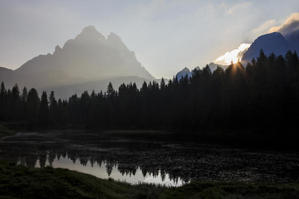 The Three Peaks of Lavaredo are reflected in Lake Antorno at sunrise. Veneto Sesto Dolomites Italy Europe