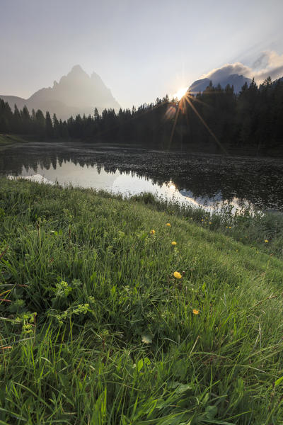 The Three Peaks of Lavaredo are reflected in Lake Antorno at sunrise. Veneto Sesto Dolomites Italy Europe