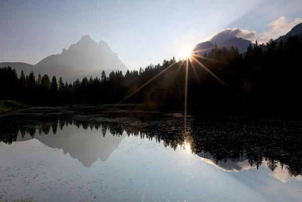 The Three Peaks of Lavaredo are reflected in Lake Antorno at sunrise. Veneto Sesto Dolomites Italy Europe