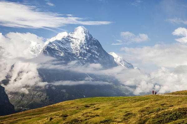 Hikers on the way to Mount Eiger First Grindelwald Bernese Oberland Canton of Berne Switzerland Europe